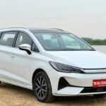 BYD eMax 7 electric MPV parked outdoors, highlighting its modern design and eco-friendly appeal featured in the blog ‘7 Bold Wins & Flaws of the BYD eMax 7